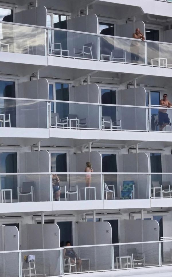Image showing a child stood on a cruise balcony table