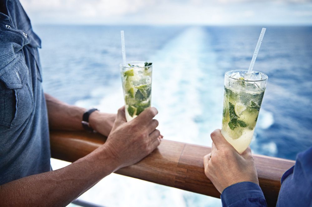 Cruise guests sharing a drink