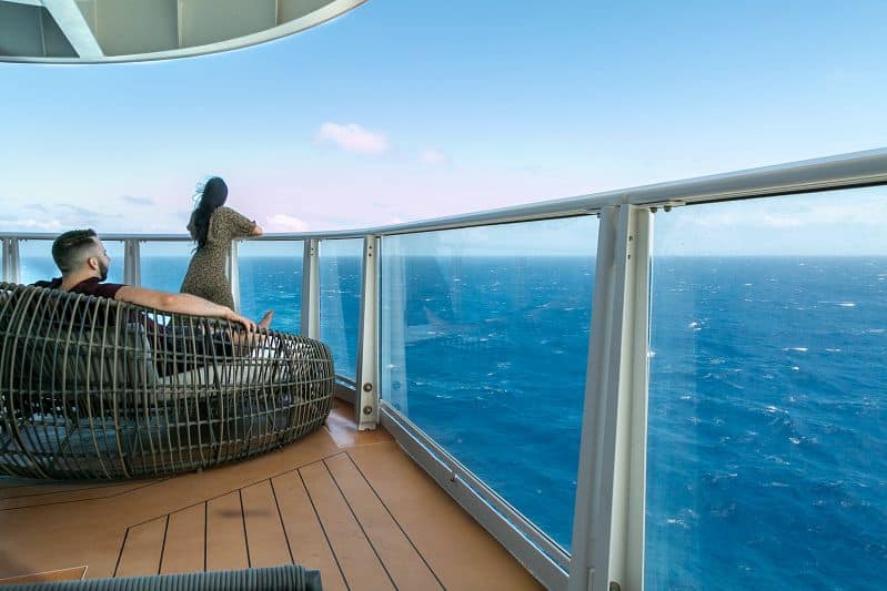 couple not speaking on balcony of a Carnival cruise