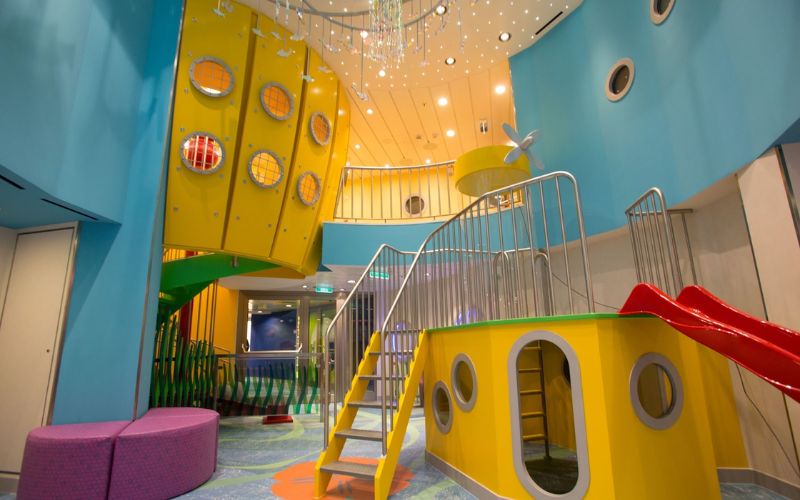 A vibrantly-colored play area for kids onboard