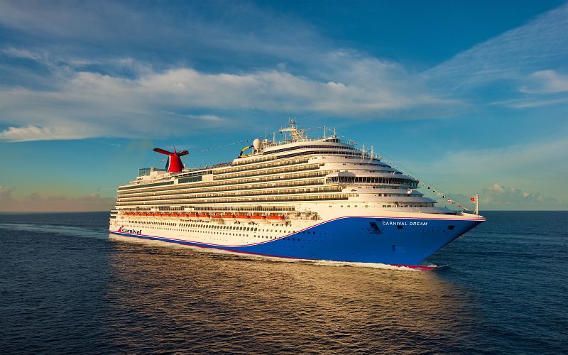 A Carnival Dream cruise ship gliding through the ocean waters.