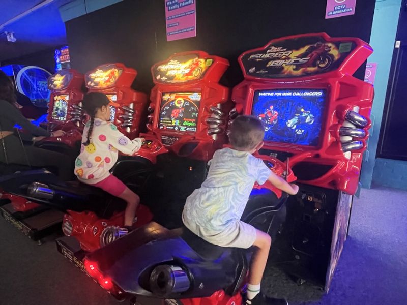 Child at High Score Arcade