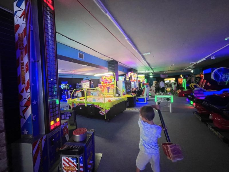Child at High Score Arcade
