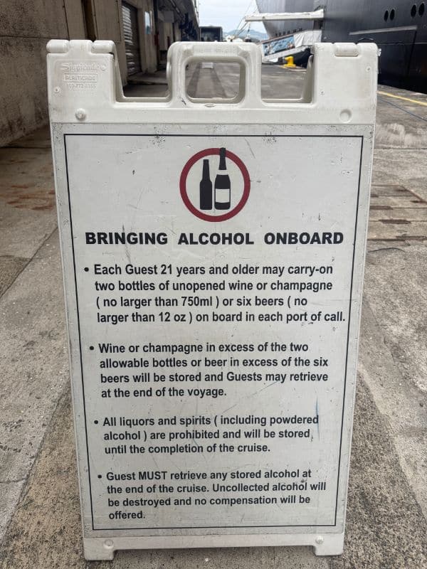 A sign showing how much alcohol you can bring on a Disney cruise