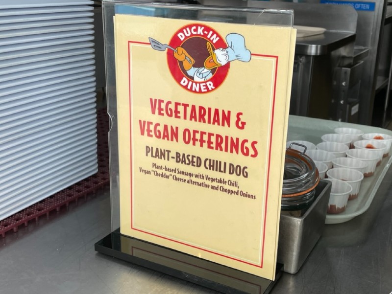 Duck in diner vegan sign.