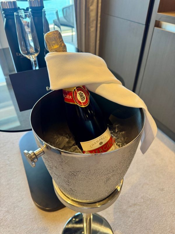 Bottle of champagne in a cabin on Explora Joureys