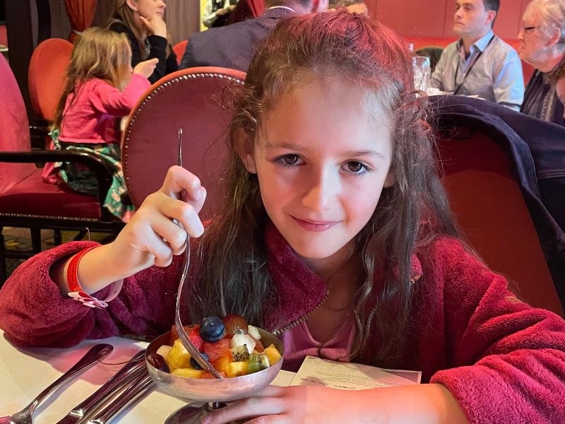 My daughter diningh on a cruise