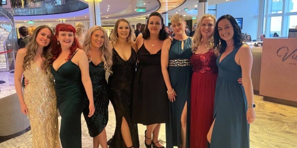 Me and my friends on a cruise wearing formal dresses