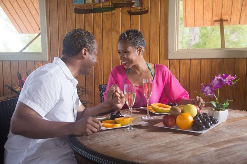 A couple enjoying food on Half Moon Cay