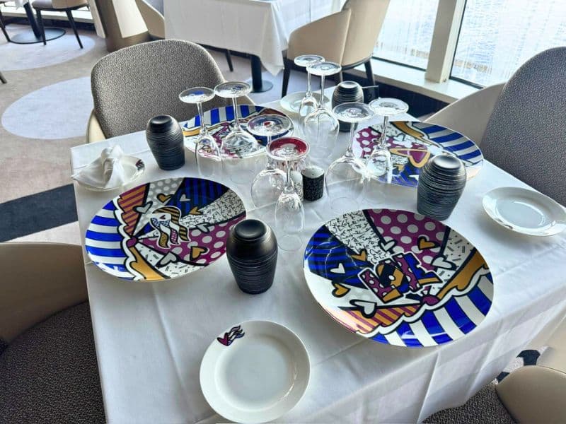 A table at the Love By Britto restaurant on Sun Princess