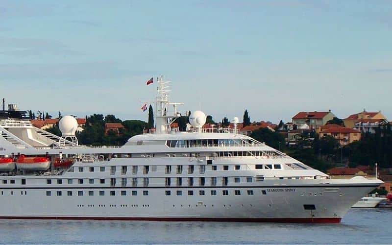 A large white cruise named Seabourn Spirit sailing on the water.