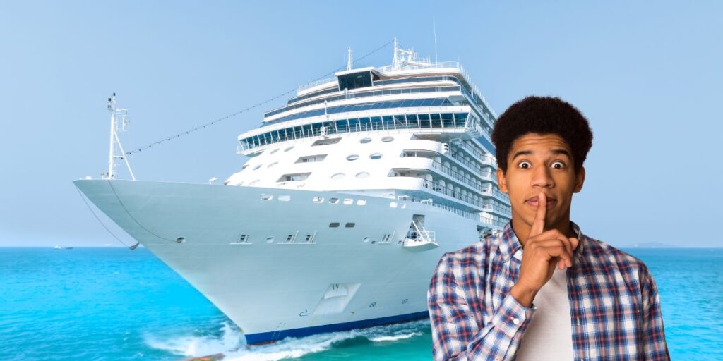 A surprised young Black man in a plaid shirt gestures for silence with his finger to his lips, standing in front of a large cruise ship on a bright blue ocean background. The juxtaposition suggests secrecy or unexpected discoveries related to the cruise experience.