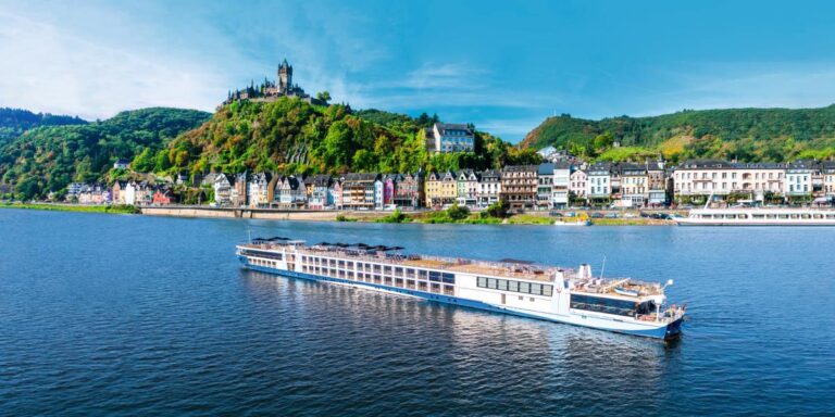 TUI ship sailing past Cochem on the Rhine