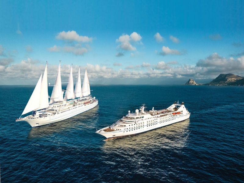 Two Windstar Cruises ships sailing on the open ocean