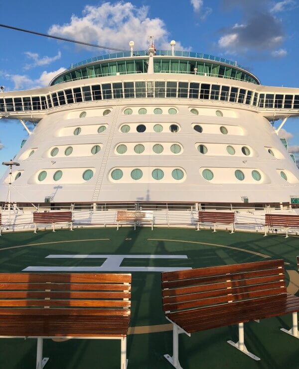 View of a helipad on the front of a cruise ship