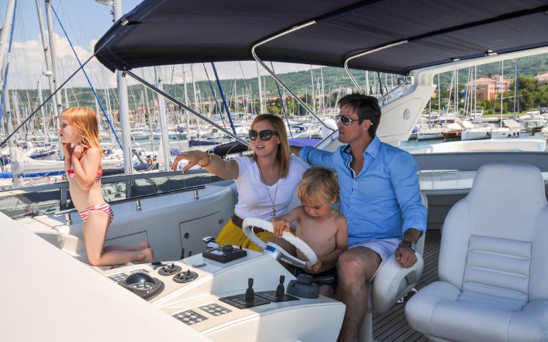 a family enjoying a yachting weekend