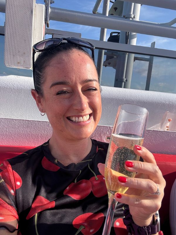 Cruise Mummy with a glass of fizz on Virgin Voyages