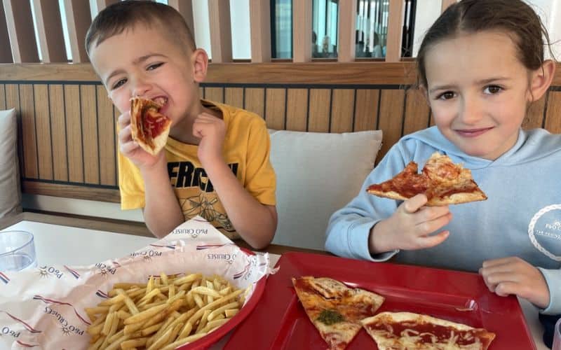 My children eating their pizza and fries on a P&O Cruise