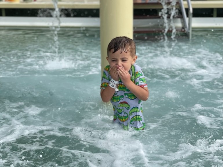 Adam in the water on a cruise
