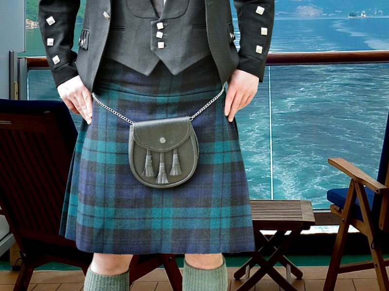 Man wearing a kilt on a cruise