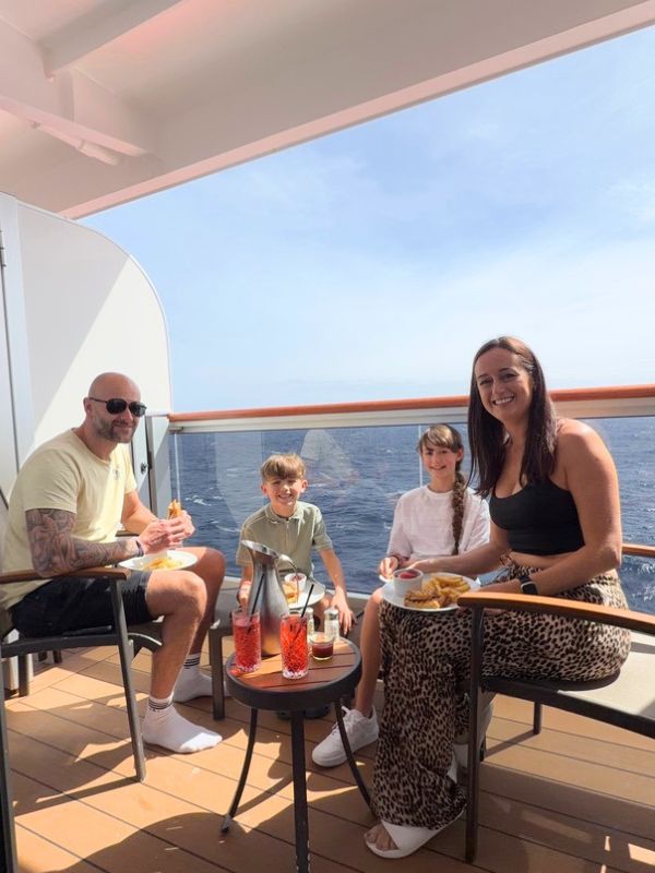 my family eating lunch on the balcony