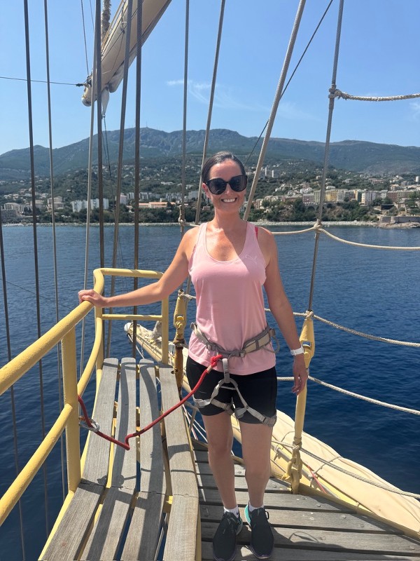 Cruise Mummy climbing the mast onboard Royal Clipper