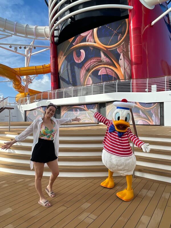 Cruise Mummy and Donald Duck outside the Disney Wish Funnel Suite
