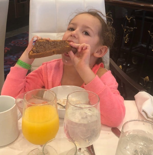 Girl enjoying free orange juice