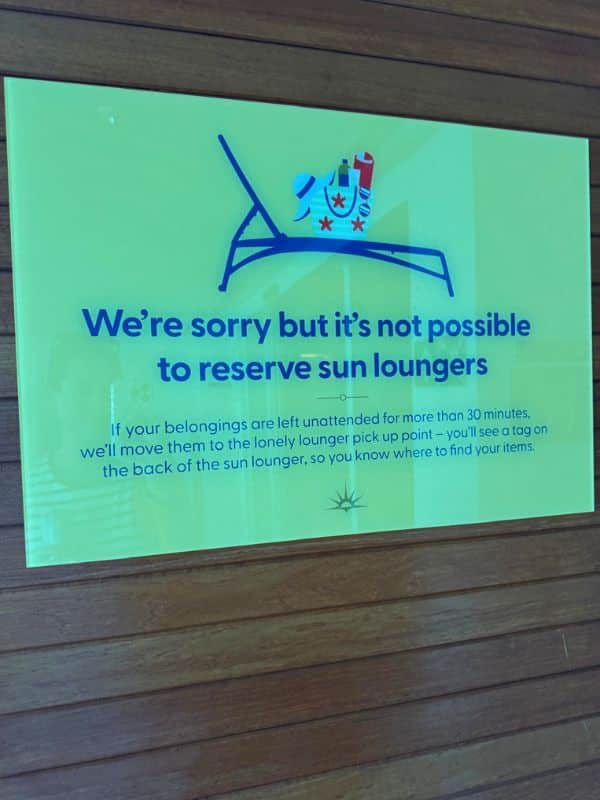 reserved sun lounger sign