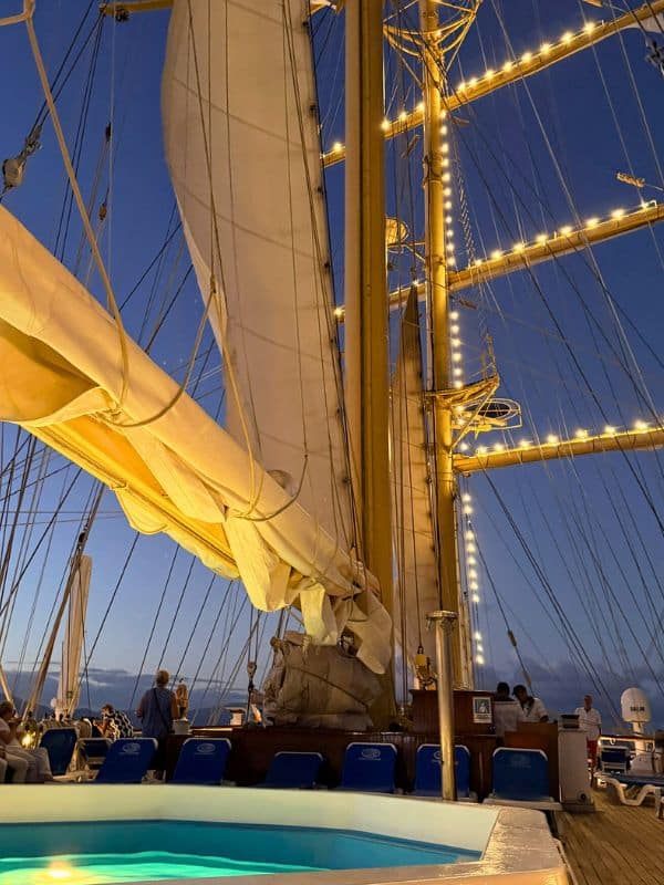 Sails of a tall ship at night