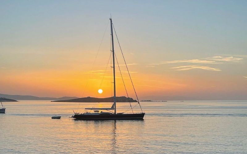 Yacht in Mykonos at sunset